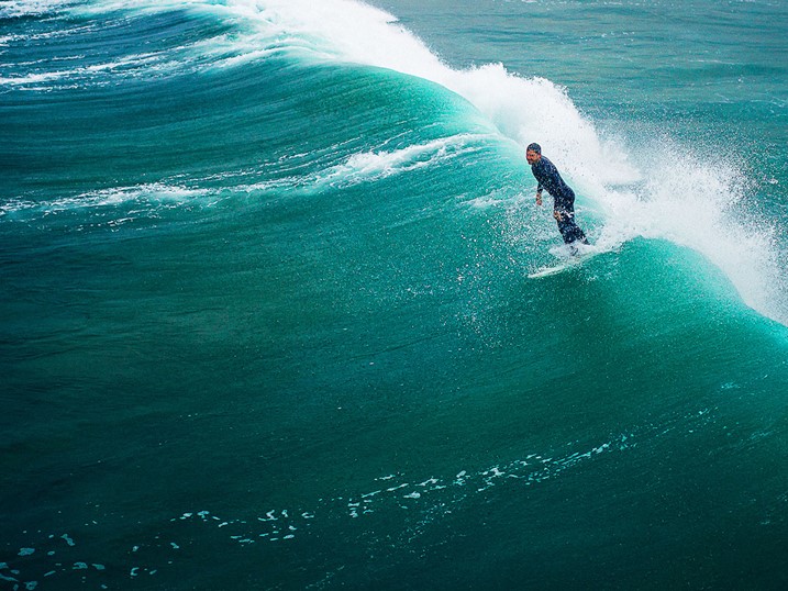 Man surfing on sea waves 