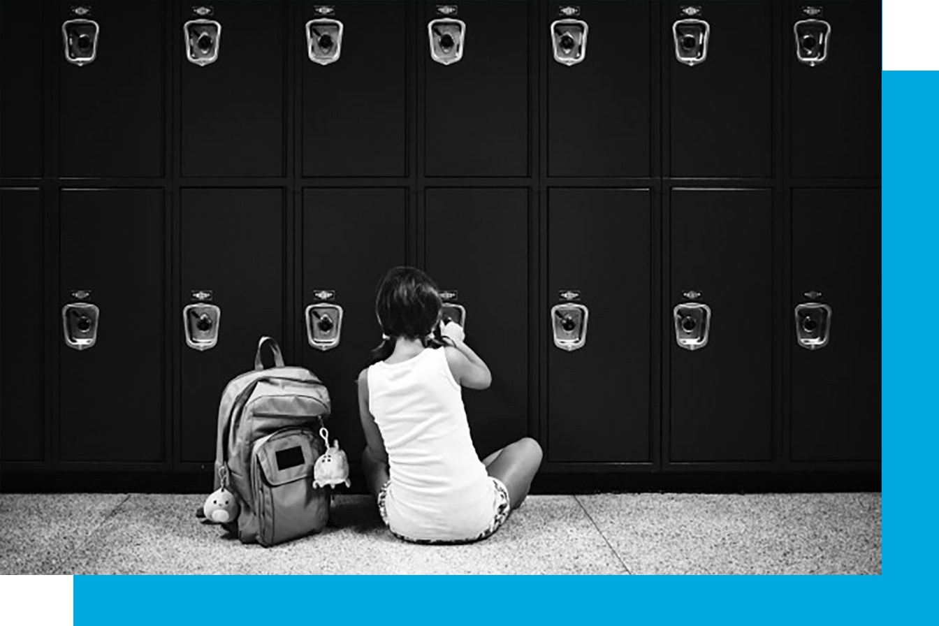 child investigating lockers