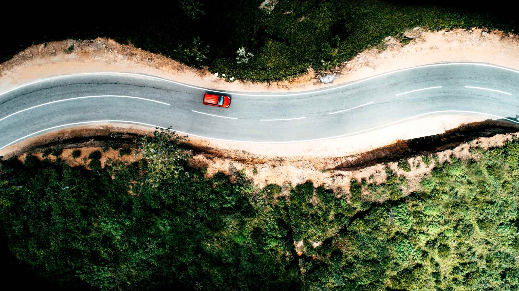 A photo shows a car on road