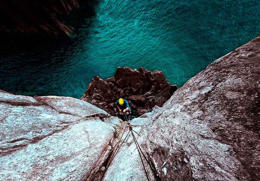 Man climbing on rock 