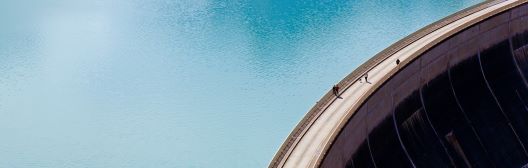 People walking on a dam