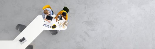 Two people working