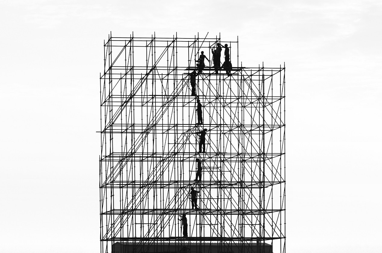 A group of people on a scaffolding