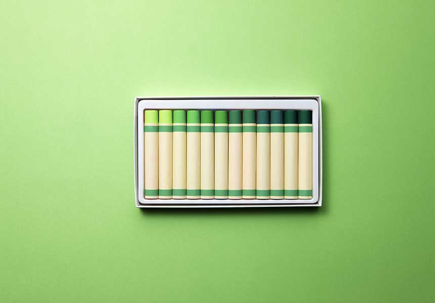 Box of green shade wax crayons