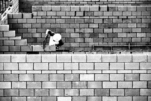 Person building wall