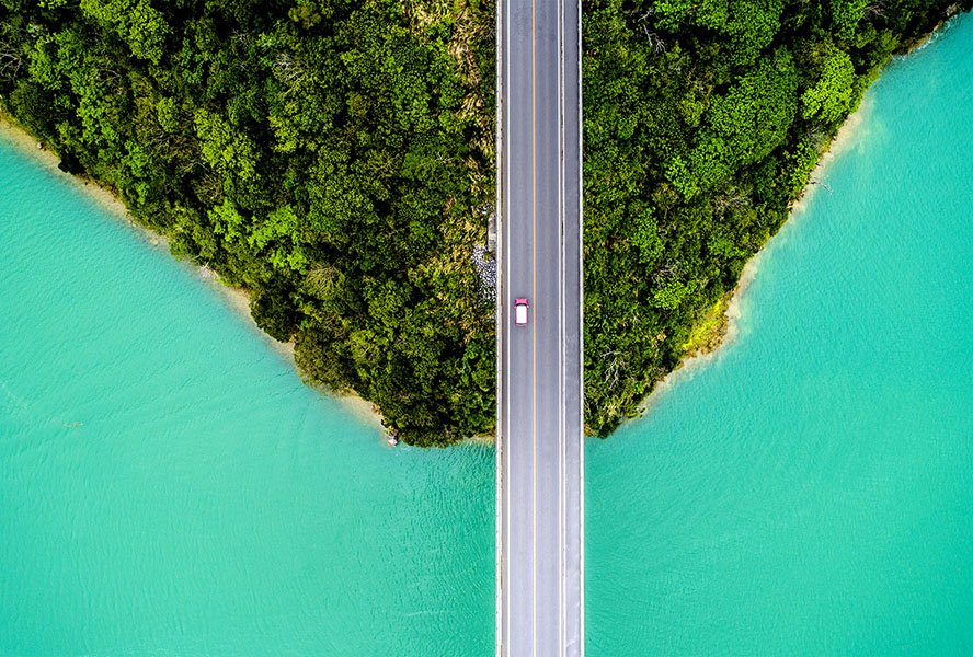 Car crossing a bridge.