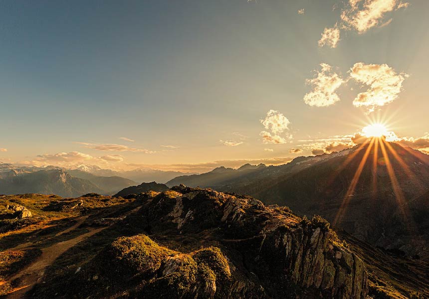 View of sunrise near mountains range