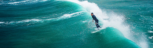 Surfer riding a wave