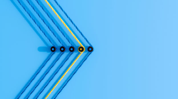 A blue background with threads forming forward looking arrows