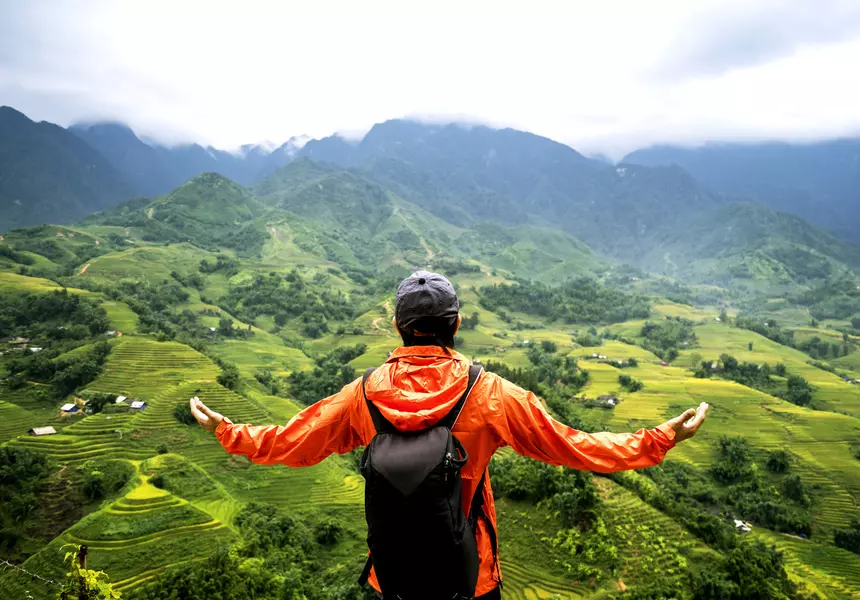 Men standing on mountain