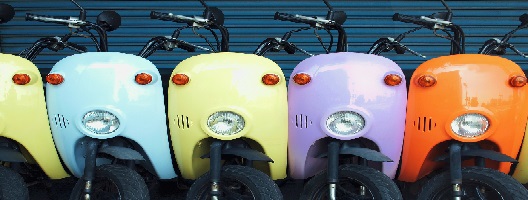 image of different colored vespas