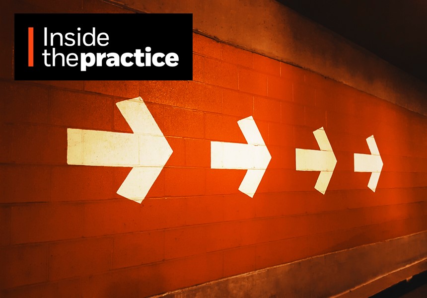 Arrows on a wall showing direction