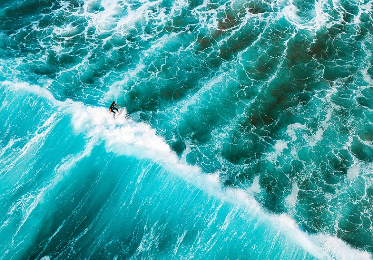 A man surfing on the ocean