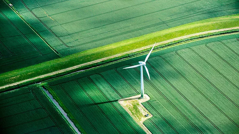 Windmill in green fields