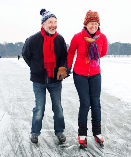 retired couple ice-skating